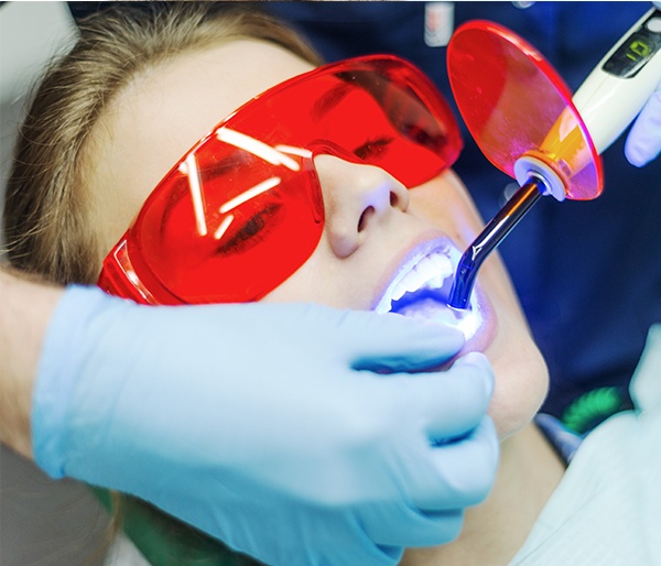 Patient receiving cosmetic dental bonding