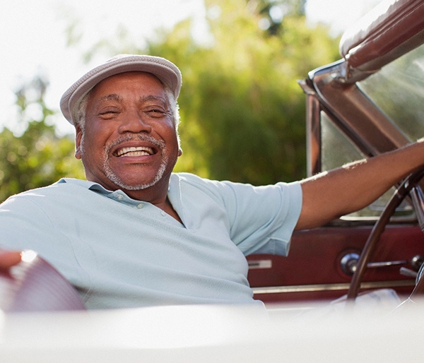 Man after learning how dentures are made in Flint