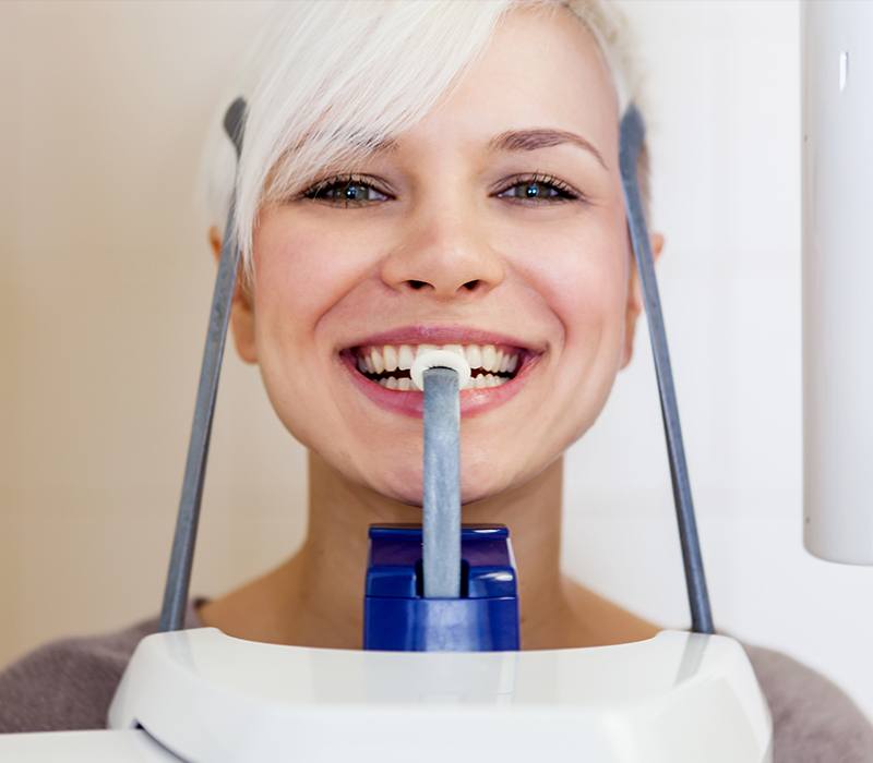 Closeup of woman receiving 3 D C T conebeam x-ray scan