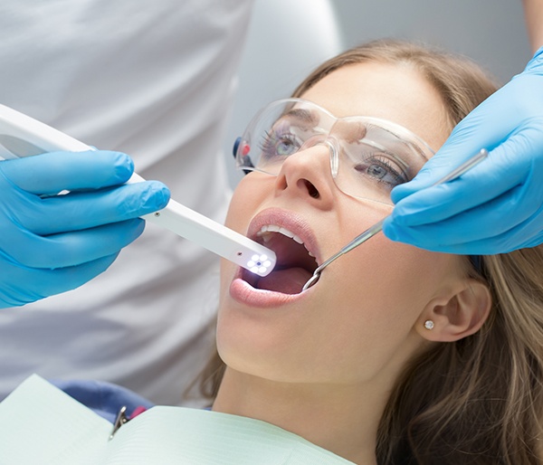 Dentist capturing intraoral images