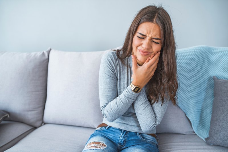 Woman with painful toothache