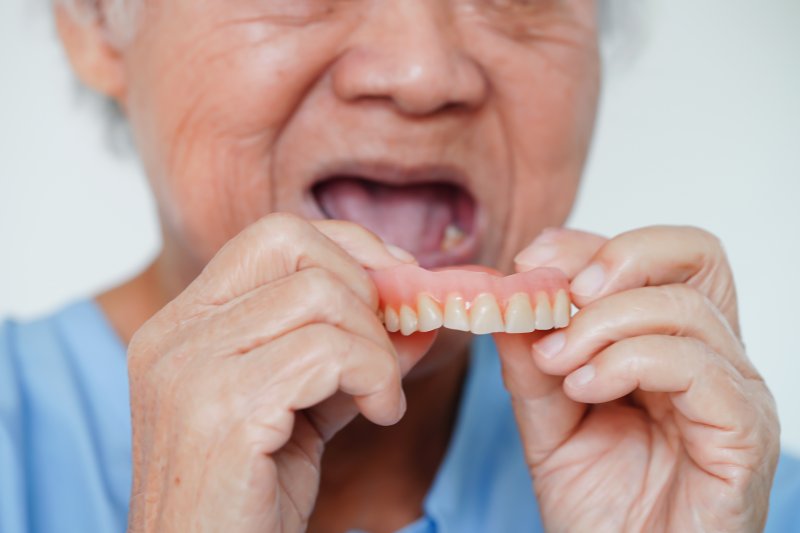 person with dentures